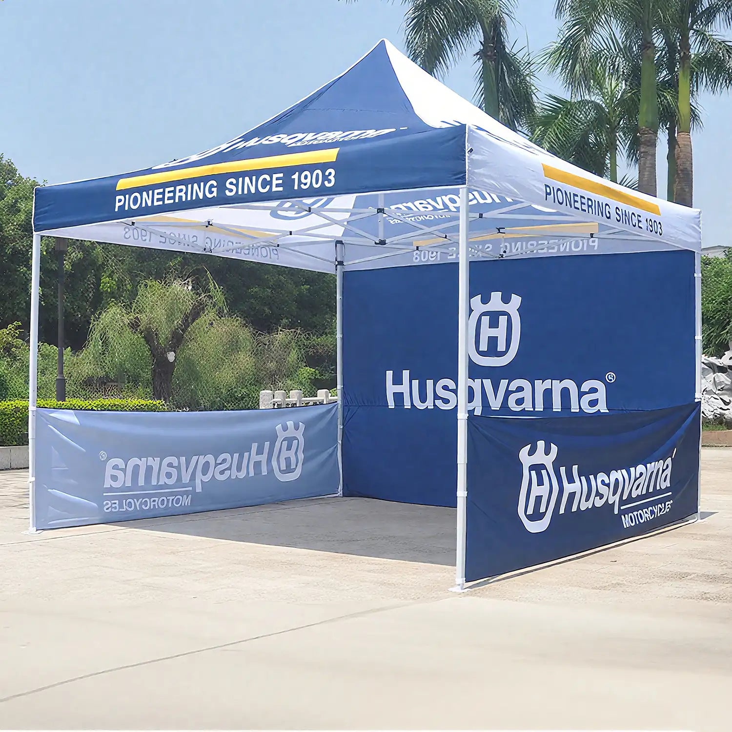 Portable custom pop-up tent with a blue canopy and open sides, suitable for outdoor events and trade shows